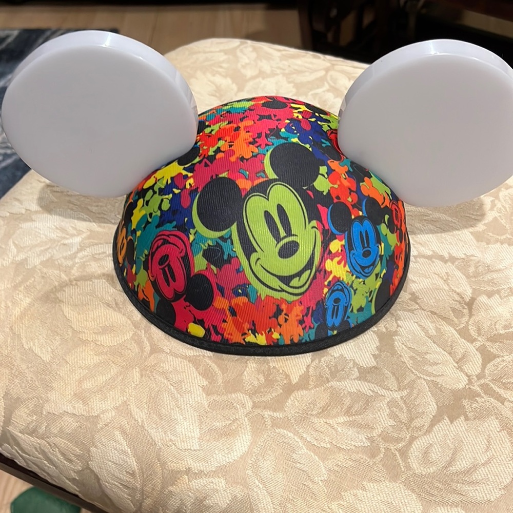 Disneys glow with the show ears.   Great condition